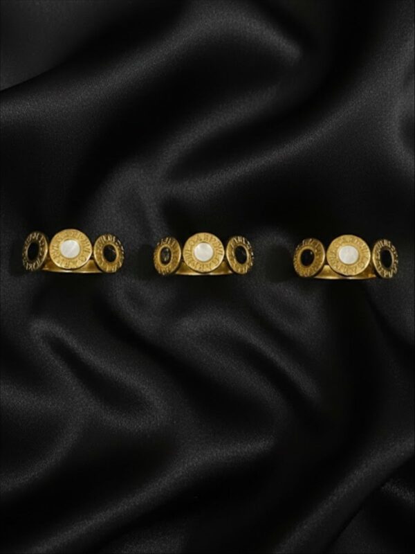 Black and white orbit ring
