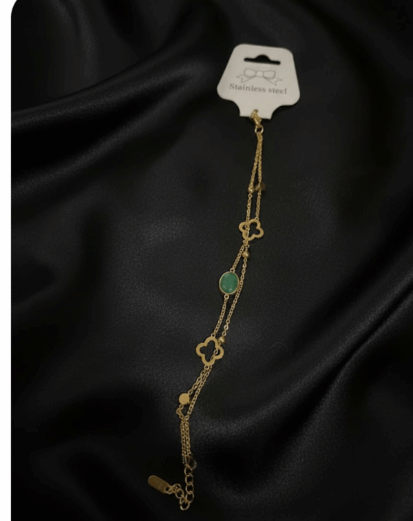 Golden delicate double chain with stone